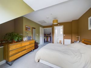 Bedroom 1 showing walk-in wardrobe & ensuite- click for photo gallery